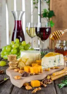 wine, cheese, and crackers on a table for an upscale Open House in Clarksville TN
